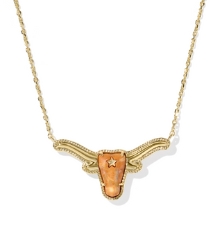 Gold necklace with a unique pendant on a white background