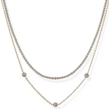 Two layered necklaces with small round stones on a white background