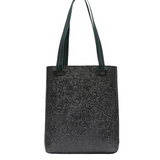Black textured tote bag with green straps on a white background
