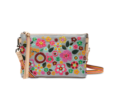 Floral embroidered handbag on a white background