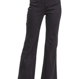 Black flared jeans on a white background