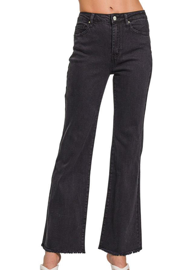 Black flared jeans on a white background