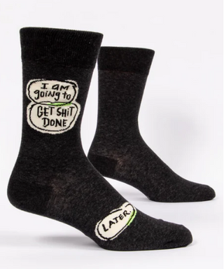Black socks with humorous text design on a white background