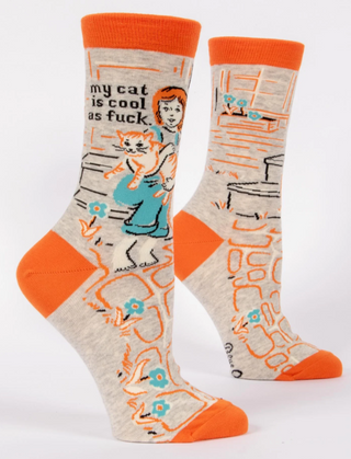 Pair of socks with cat-themed design and orange accents on a white background