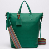 Green handbag with a colorful strap on a white background