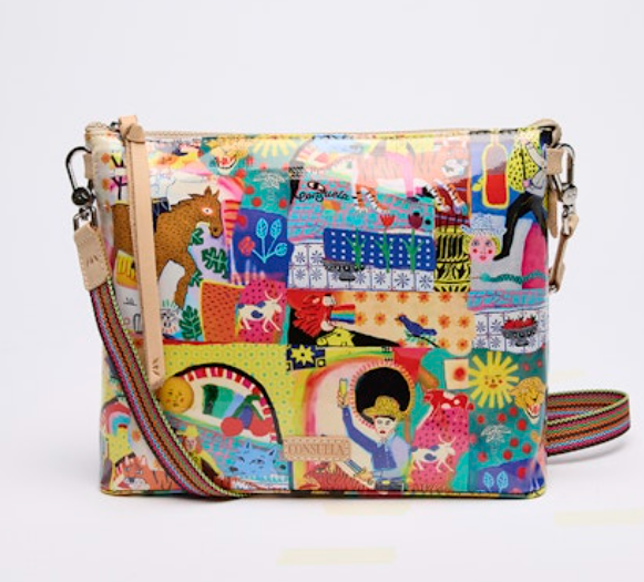 Colorful patterned handbag with a strap on a white background