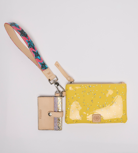 Yellow wallet with floral strap on a light gray background