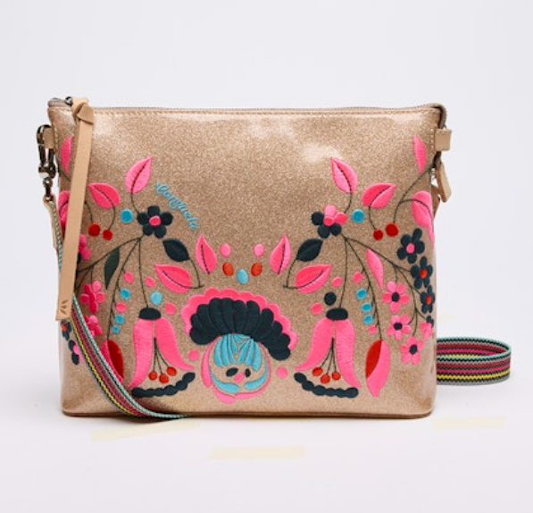 Beige handbag with colorful floral embroidery on a white background