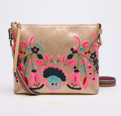 Beige handbag with colorful floral embroidery on a white background
