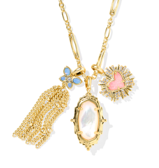 Gold necklace with various pendants on a white background