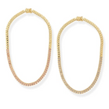 Gold hoop earrings on a white background