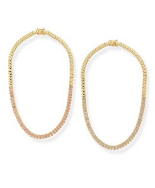 Gold hoop earrings on a white background
