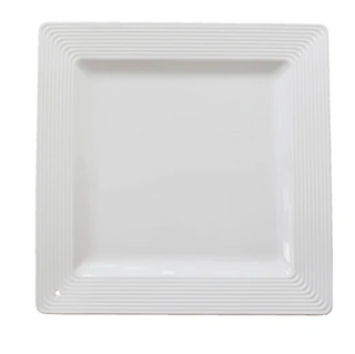 White rectangular plate with textured rim on a white background