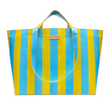 Blue and yellow striped tote bag on a white background