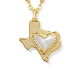 Gold necklace with a pendant shaped like the state of Texas featuring a heart in the center on a white background.