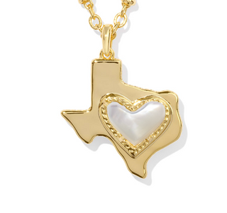 Gold necklace with a pendant shaped like the state of Texas featuring a heart in the center on a white background.