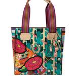 Colorful handbag with floral and cactus designs on a white background