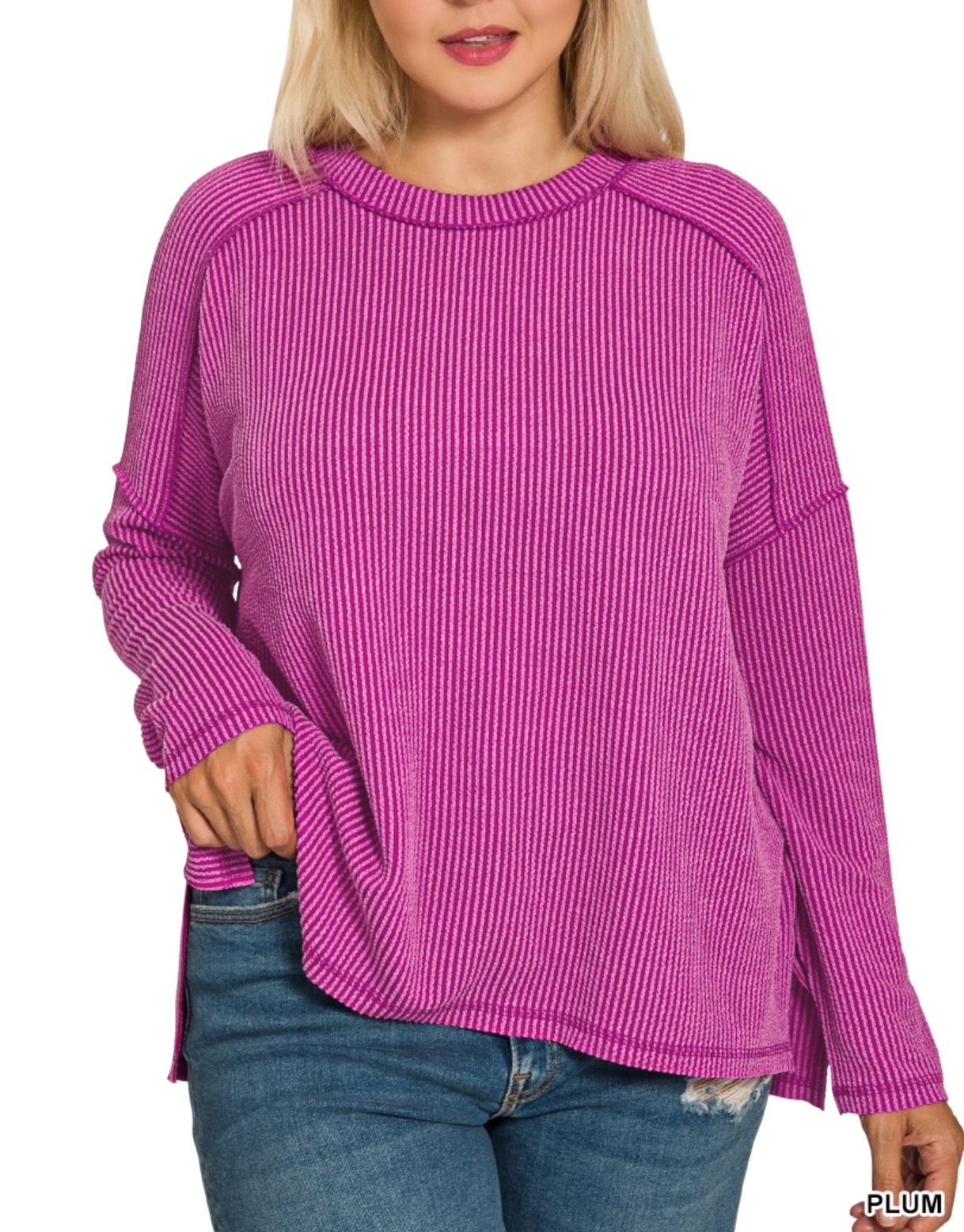 round next plum colored long sleeve top on model