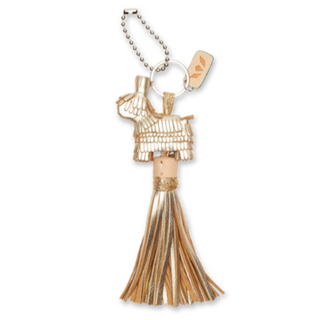 Gold tassel keychain on a white background