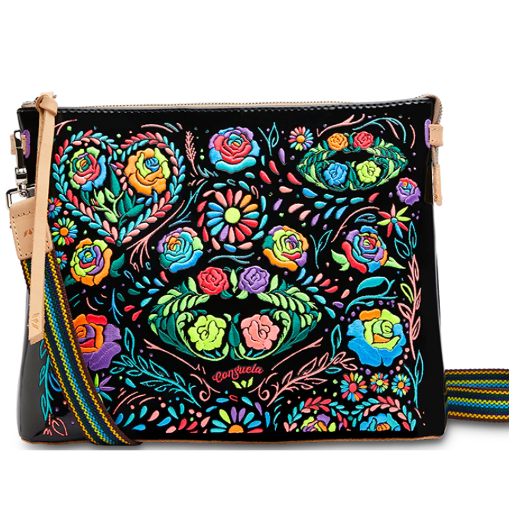 Colorful floral patterned bag with a black background