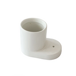 White plastic fitting on a white background