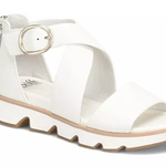 White sandal with a gold buckle on a white background