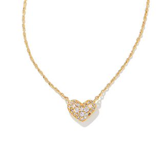Gold necklace with a heart-shaped pendant on a white background