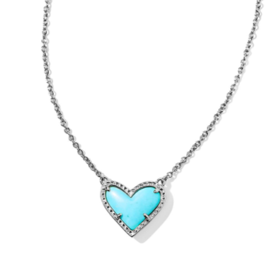 Necklace with a turquoise heart-shaped pendant on a white background