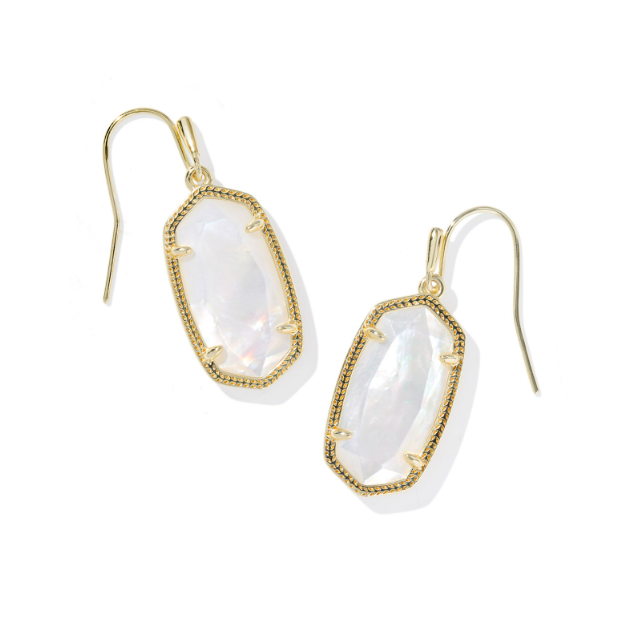 Gold-framed white stone earrings on a white background