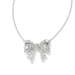 Silver bow-shaped necklace with clear stones on a white background