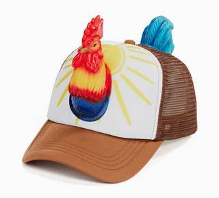 Cap with rooster design and yarn on a white background