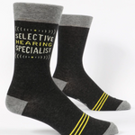 Black socks with gray accents and yellow text on a white background
