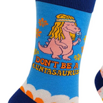 Sock with a cartoon dinosaur holding flowers and text on a blue background