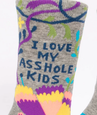 Gray sock with colorful designs and text on a white background