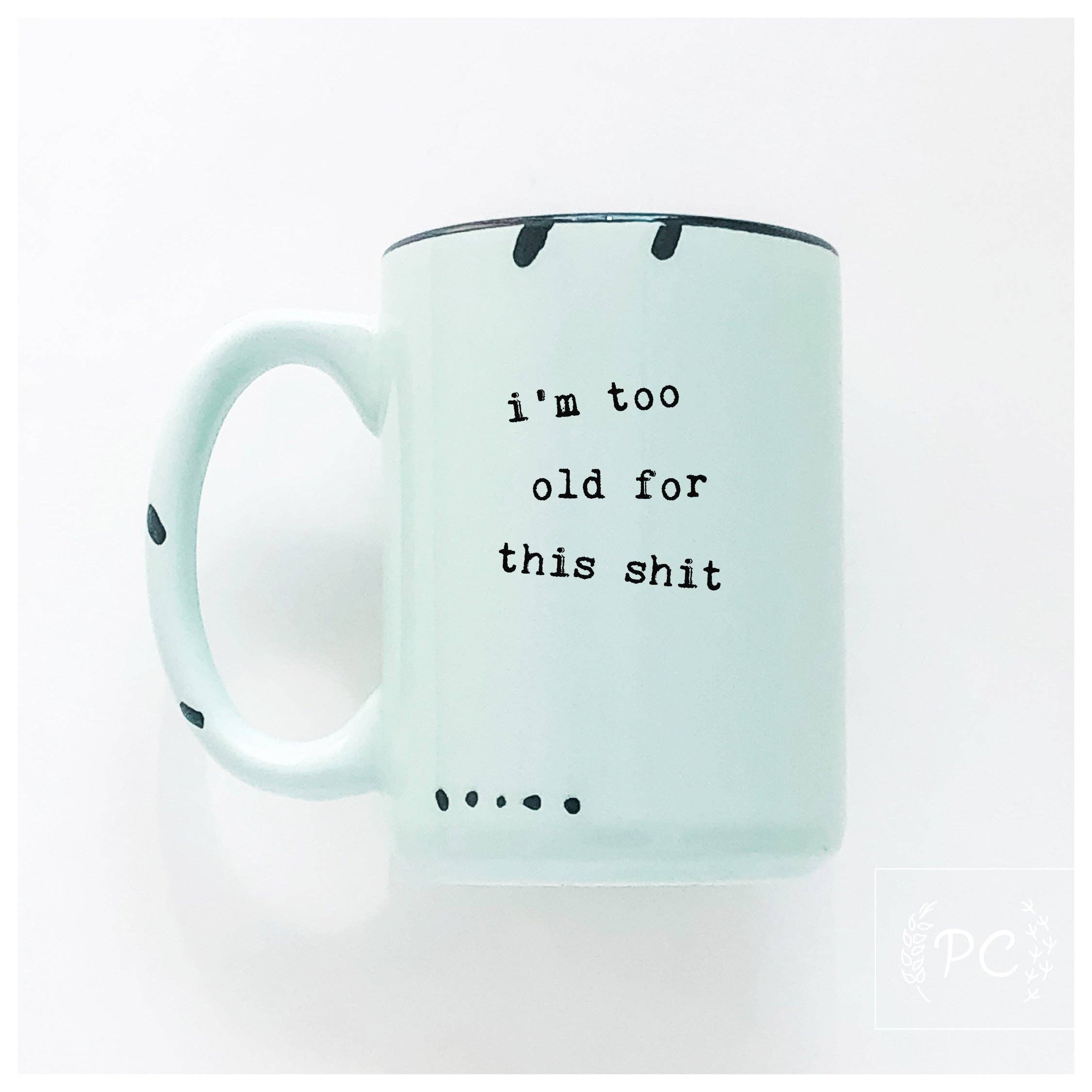 Mug with text 'i'm too old for this shit' on a white background