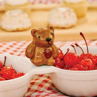BEAR FIGURINE ON A PLATTER
