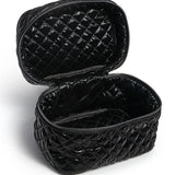 Black quilted makeup bag on a white background