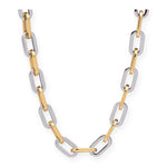 Two-tone gold and silver chain necklace on a white background