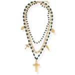 Multi-layered necklace with green beads and gold accents on a white background