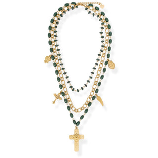 Multi-layered necklace with green beads and gold accents on a white background