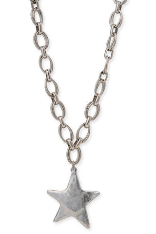 Silver chain necklace with a star pendant on a white background