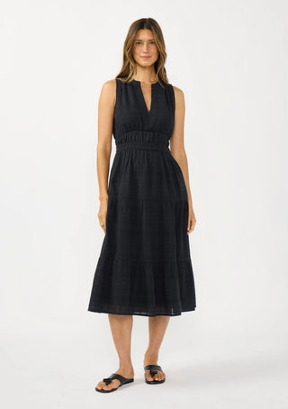 Woman wearing a black dress on a white background
