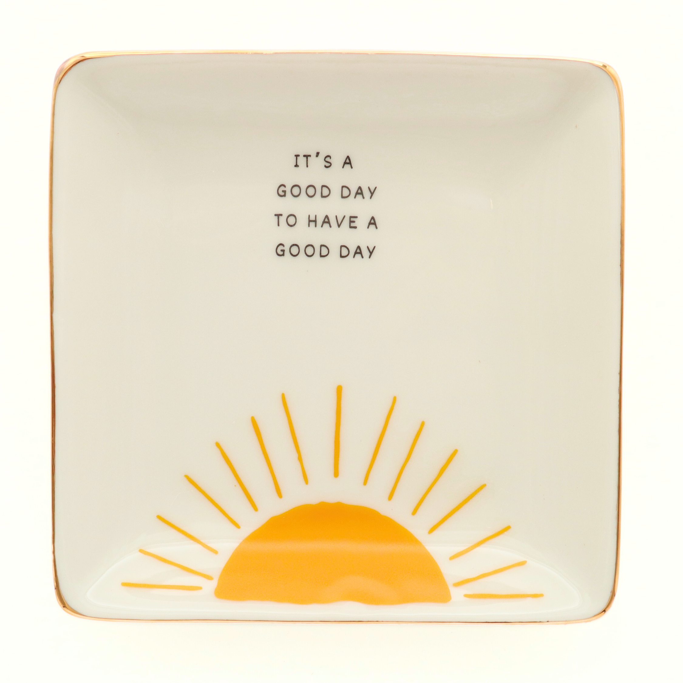 Decorative plate with sun design and text 'It's a good day to have a good day' on a white background