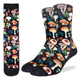 Colorful mushroom-patterned socks on a black background