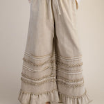 latte color pants with ruffles 