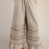 latte color pants with ruffles 