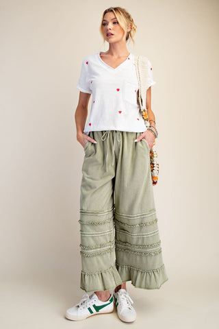 SAGE PANTS with model in sneakers