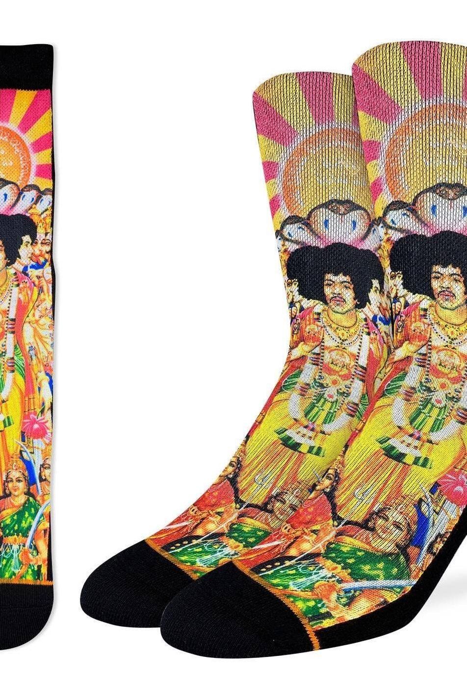 Colorful socks with a graphic design of a person in a vibrant outfit on a white background