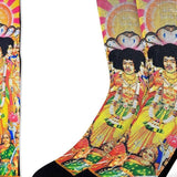 Colorful socks with a graphic design of a person in a vibrant outfit on a white background