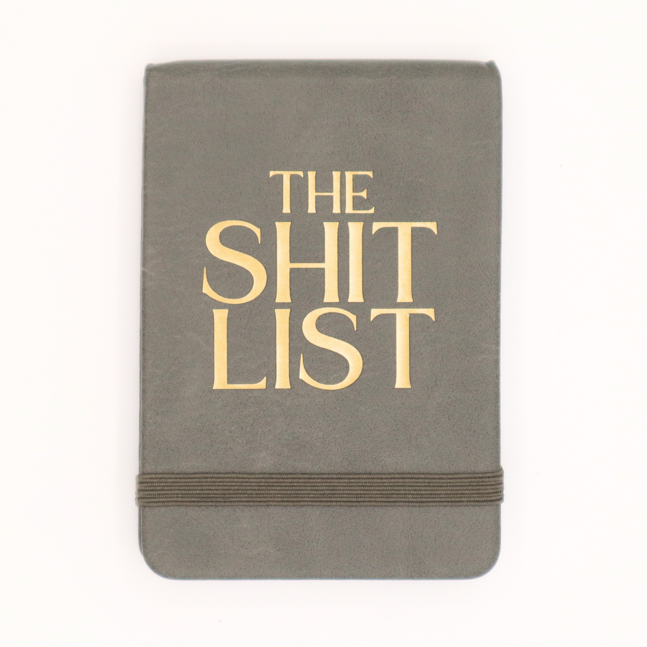 Gray notebook with 'The Shit List' in gold on a white background